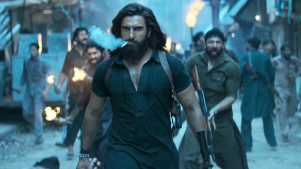 Dhurandhar box office collection poster featuring Ranveer Singh and Akshaye Khanna with housefull theatres and global blockbuster theme